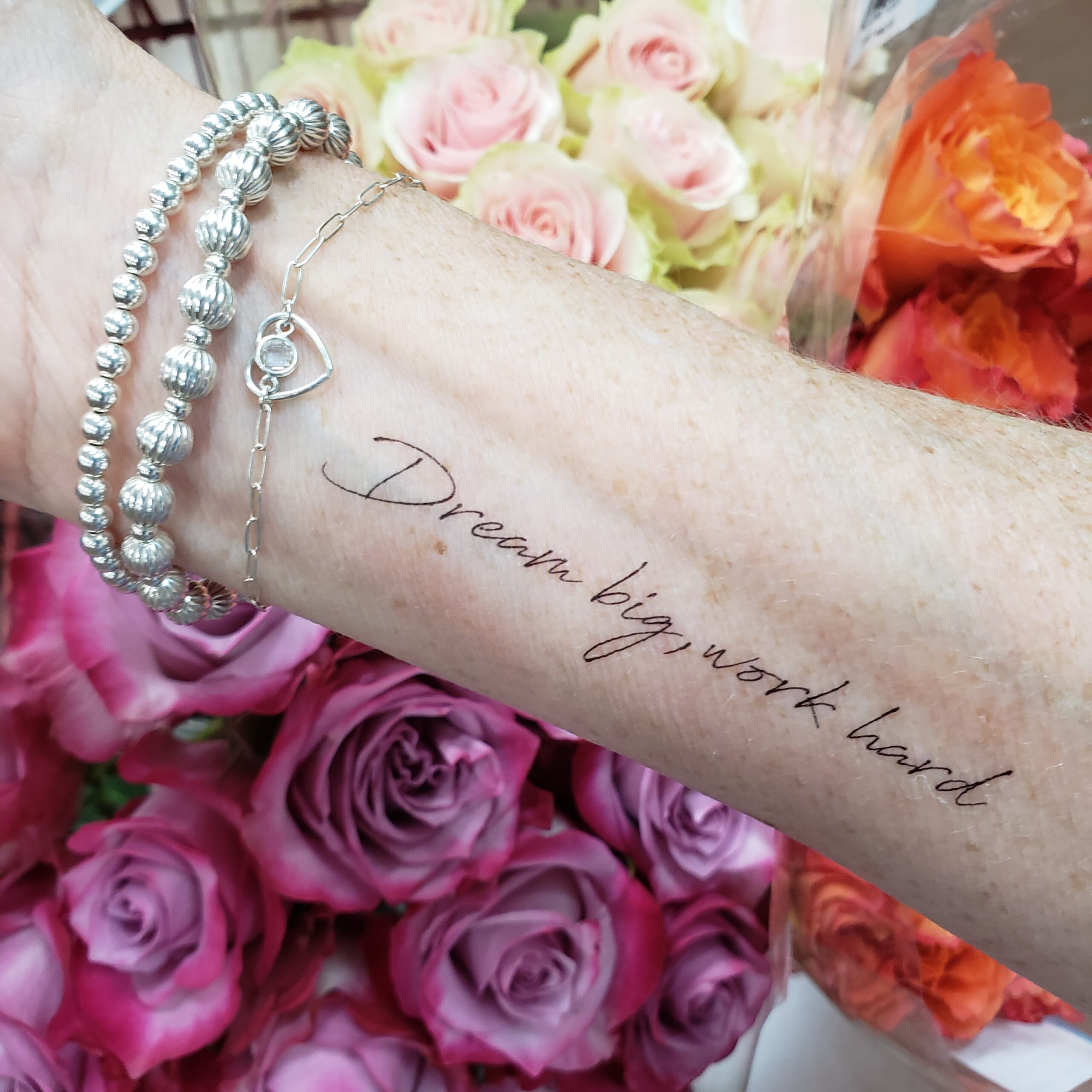 Permanent jewelry bracelet on a wrist at Lux Jewelry Lounge in Bellevue
